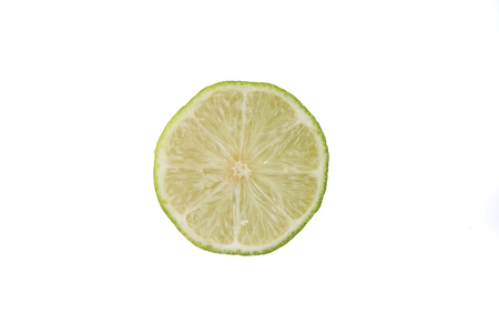 Green Lime with slice cutting isolated on white background