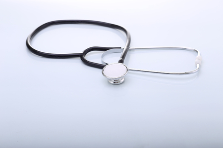 Stethoscope over the white bacground.の写真素材