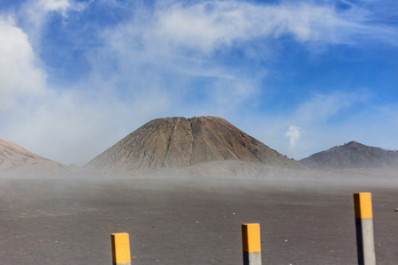 The foggy of mount Batuk, indonesia during daylightの写真素材
