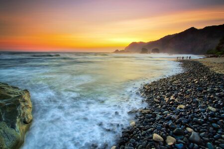 Majestic moment at Papuma beach,Indonesiaの写真素材