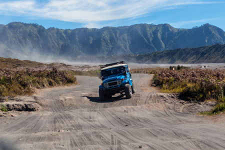 BROMO, INDONESIA - 9th May 2018; 4WD Jeep in Savana land in Bromo Tengger Semeru national park, East Java, Indonesiaのeditorial素材