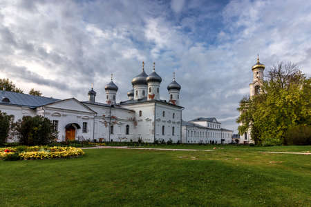 Panorama of the ancient male St. George Monastery in the suburbs of Veliky Novgorod. Autumn bright photo of the tourist places of Russiaの写真素材
