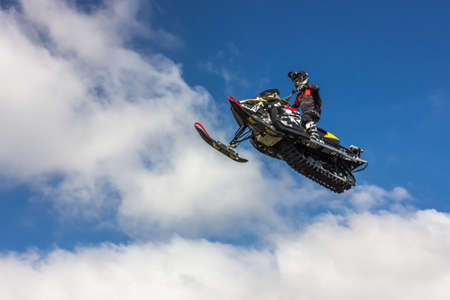 Motor freestyle. Incredible jumps with acrobatic elements that were performed by professionals during motocross. Speed and style, the flight of a motorcycle in the air. Differentの写真素材