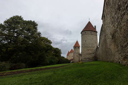 Walls of an old castle with towers in the center of Tallinn's old townのeditorial素材