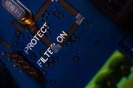 Printed circuit board with many electrical components. Technological equipment of modern data storage server systems. Computer motherboard, close-up, full frame, right overの写真素材