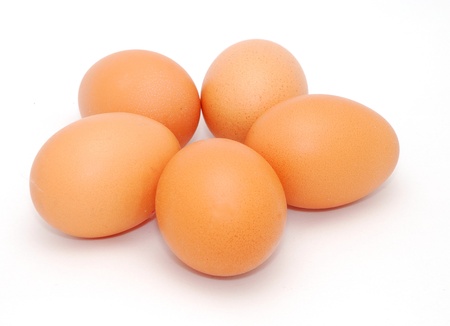Five eggs isolated on the white background.の写真素材