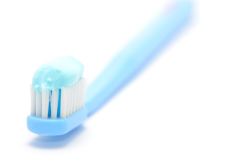 Macro shot of toothbrush on the white background 