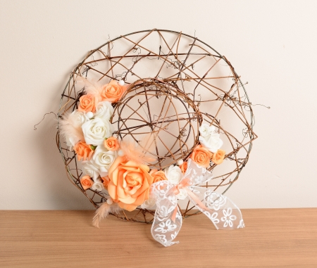 Interior decoration, wreath with orange rose and ribbon の写真素材
