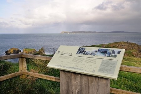 BALLINTOY, NORTHERN IRELAND - OCTOBER 27  Carrick-a-Rede tourist sign at Ballintoy on October 27, 2012 in Ballintoy, Northern Ireland  Carrick-a-Rede is famous rope bridge  Its 30 metre deep and 20 metre wide のeditorial素材