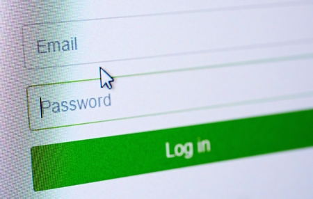 Password and email blank forms and arrow cursor at login screen on the web site.の写真素材