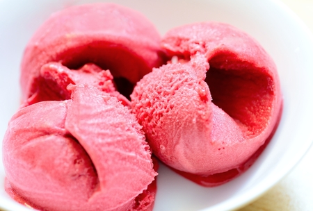 Raspberry ice cream sorbet scoops closeup. Raspberry sorbet. Ice cream sorbet. Fruit sorbet.の写真素材