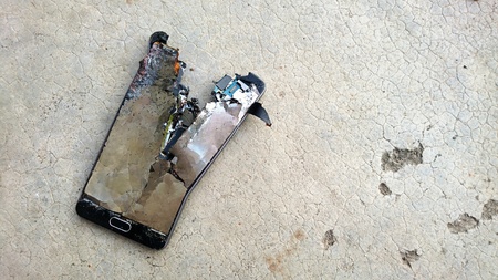Totally broken mobile phone.の写真素材