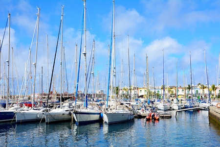 Boats in port of Puero de Mogan on Gran Canaria.の写真素材