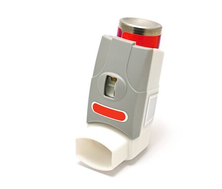 Medicinal asthma inhaler on white background.の写真素材