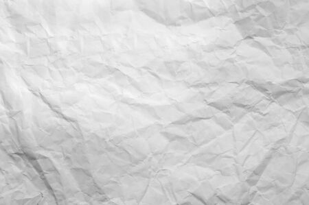 Full frame texture of blank crumpled and wrinkled white paper background.の写真素材