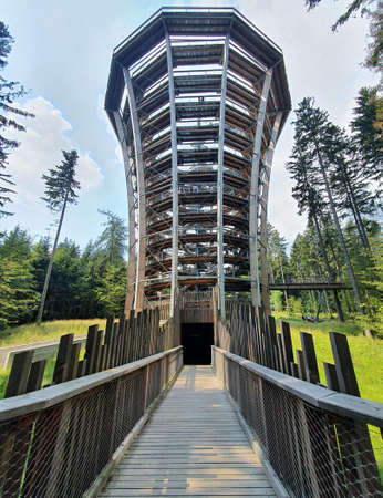 JANSKE LAZNE, CZECH REPUBLIC - AUGUST 09, 2020: Observation tower of the Krkonose Tree Top Walk trail. This trail in tree tops is located in forests of Krkonose National Park (Giant Mountains) near Janske Lazne town.のeditorial素材