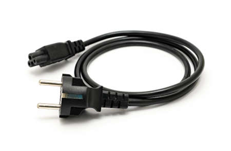 An AC Euro power plug and socket of black power cable on white background.の写真素材