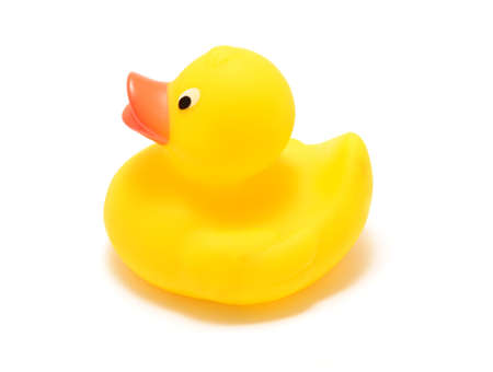 Classic floating yellow bathtub rubber toy duck over white background.の写真素材