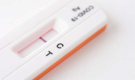 Home antigen test for capturing of  antibodies on white background. It shows negative result.の写真素材