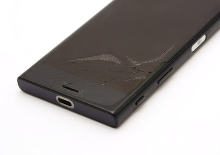 Closeup of the broken mobile phone display.の写真素材