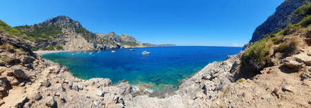 Beautiful natural beach Coll Baix (Platja des Coll Baix), Alcudia, Mallorca (Majorca). Amazing view of the turquoise clear sea of Mallorca.の写真素材