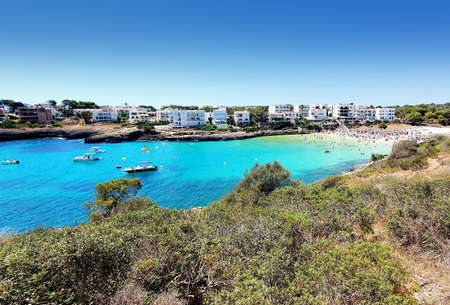 A view of beautiful beach Cala Marcal in Portocolom resort, Mallorca, Spain.の写真素材