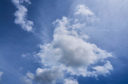 Fluffy Clouds on a blue sky day