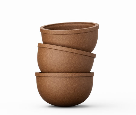 Clay pot on isolated white background Uneven stack of three brown clay cups 3d illustrationの写真素材