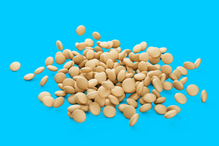 3d Creamy Sponge Cookies Or Biscuits Scattered On Blue Background, 3d illustration