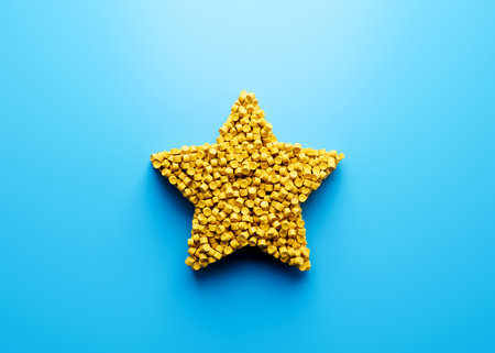 3d Unique Star Shape Symbol Made Of Yellow Plastic Polymers Sea Blue Background 3d Illustrationの写真素材