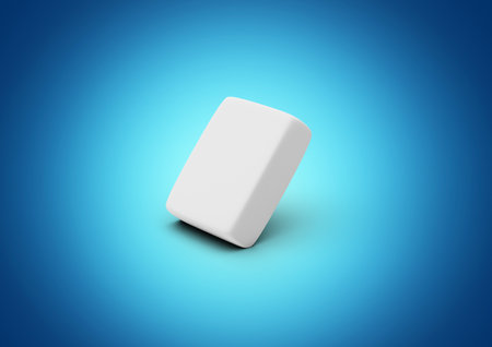 A White Sleek Cubic Eraser With Soft, Smooth Rounded Edges On Blue Background 3D Illustrationの写真素材