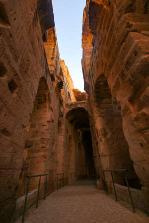 The impressive ruins of the largest colosseum in North Africa, a huge amphitheater which could hold up to 35,000 spectators, This 3rd-century monument illustrates the grandeur of Imperial ROME.の写真素材