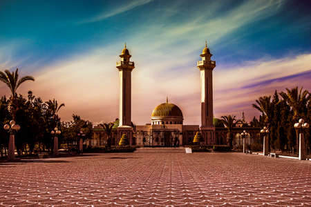 Beautiful sunset over a mosque in Rabat, Moroccoの写真素材