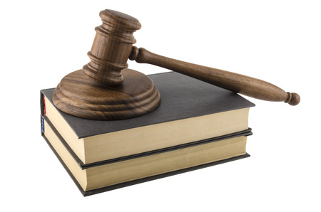 Gavel and book isolated on white backgroundの写真素材