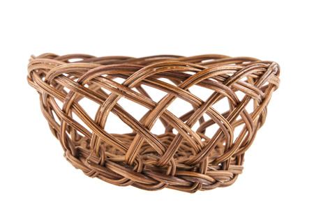 wicker basket isolated on white backgroundの写真素材