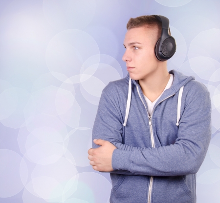 Headphones on a young man の写真素材