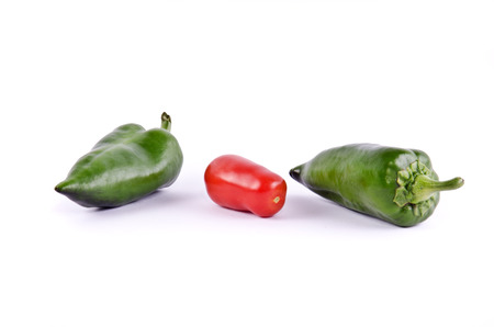 Isolated peppers and tomato