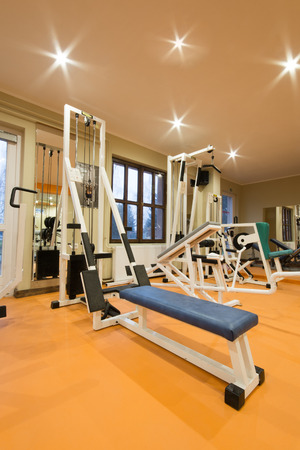 Interior view of a gym with equipment の写真素材
