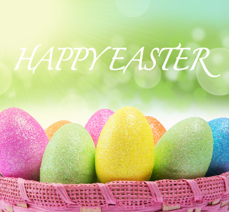 Colorful easter eggs in a basketの写真素材