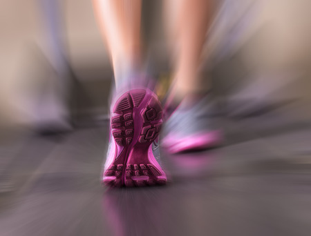 Runner feet running in fitness room closeup on shoe  Woman fitness の写真素材