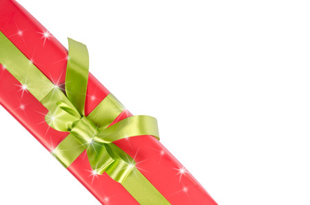 Isolated Christmas gift box with stars and green ribbon.の写真素材