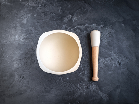 mortar for spices on stone background, top viewの写真素材