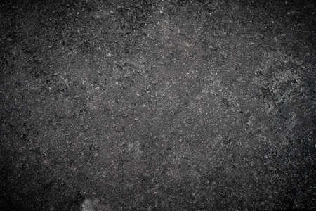 Dark gray stone texture. Background with rough surfaceの写真素材