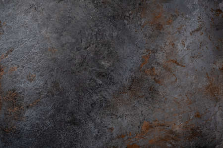 Black concrete wall texture rough shape with cracks and cutsの写真素材
