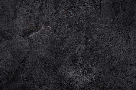 Black texture of volcanic stone surfaceの写真素材