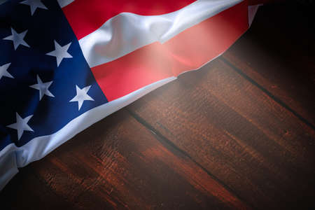 American flag on brown wooden rustic background, banner design, space for textの写真素材