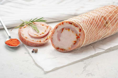 Meat chicken roll sausage on the table, homemade meatloafの写真素材