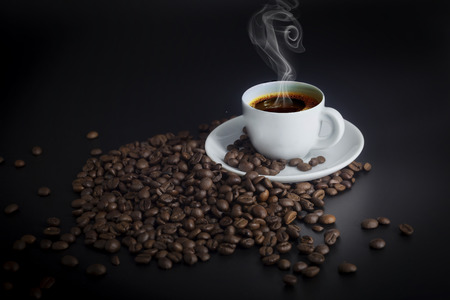 Cup of coffee and coffee beansの写真素材