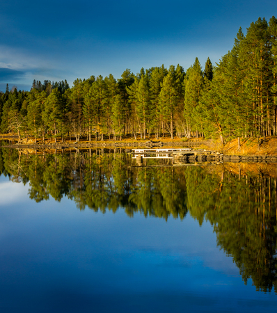 Reflection on a Swedish Lakeの写真素材