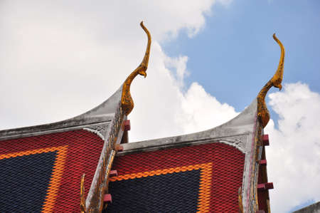 Traditional Thai style decoration of mosaic & stucco on the roof  in a temple, Ayuddhaya, Thailand